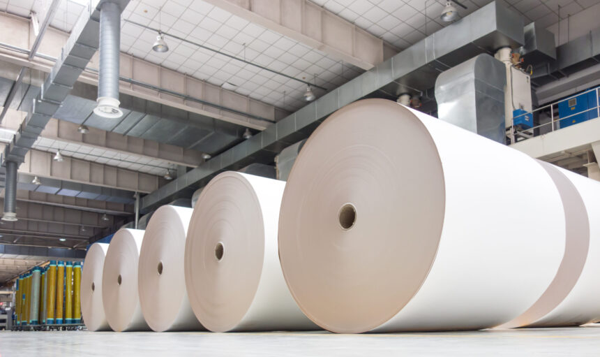 Huge industrial rolls placed in a warehouse
