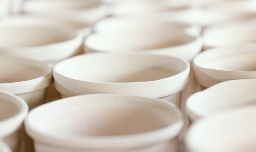 Plain handmade ceramics with soft pastel color toned.Macro shot with soft focus and very shallow depth of field, some objects out of focus.