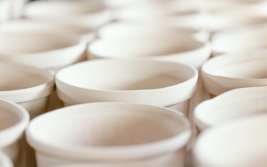 Plain handmade ceramics with soft pastel color toned.Macro shot with soft focus and very shallow depth of field, some objects out of focus.